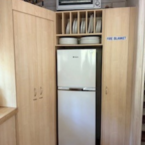 Couran Cove Eco Cabin ECm Fridge in Kitchen Image Couran Cove Eco Cabin ECm Fridge in Kitchen Image