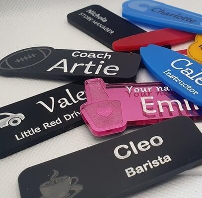 Variety of name badges in colour with resin dome lens Variety of name badges in colour with resin dome lens