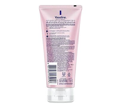 Applying Vaseline Tone‑Up lotion on skin — instant radiant glow