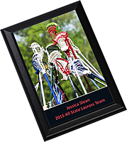 Black wooden plaque with metal panel