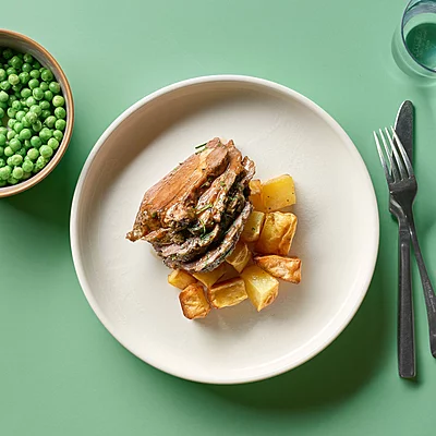 Slow-Roasted Lamb With Gravy, Roasted Potatoes And Peas