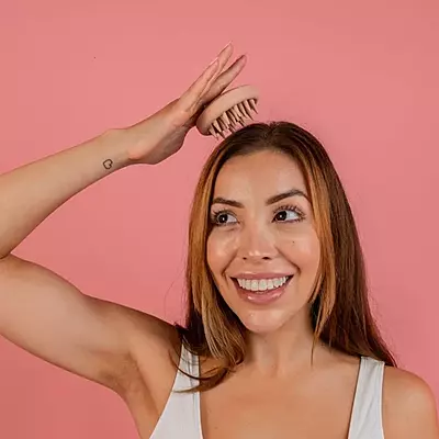 Ergonomic scalp massager for healthy hair growth