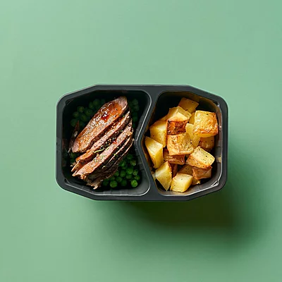 Slow-Roasted Lamb With Gravy, Roasted Potatoes And Peas