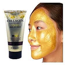 Peeling off 3W Clinic collagen gold face mask to reveal smooth skin