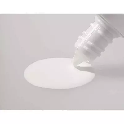 Bottle of Transino UV Protector with botanical extracts – whitening and skincare ingredients